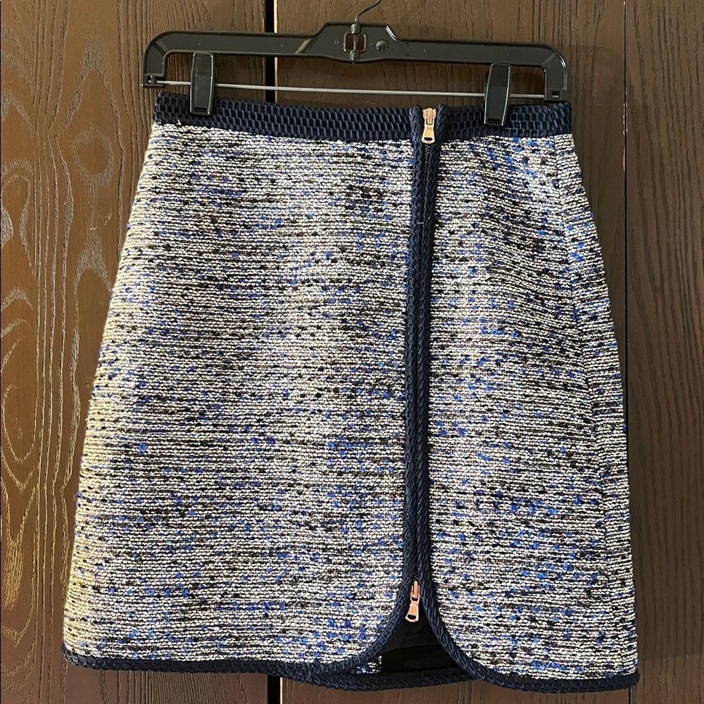 J Crew pencil, mini skirt. Woolen appearance. Size 0